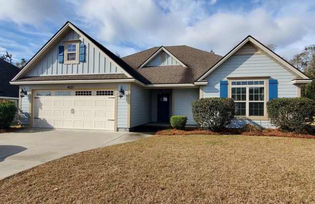 Modern Elegance in Nelson Hill: 4BR/2BA Oasis with Wood Floors, Fenced Yard, and Pet-Friendly Perks! - 4221 Nelson Hill Place, Lowndes County, GA 31632