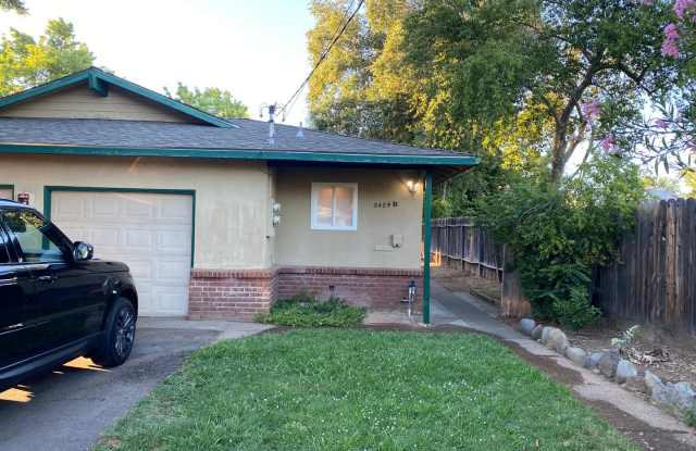Updated Two Bedroom With Laundry, Garage and Yard! photos photos