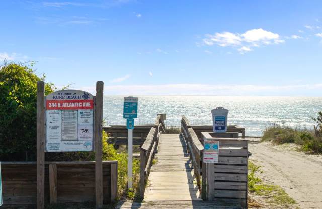 Charmed Away | Furnished 4BR/4BA Coastal Home in Kure Beach Gallery 3