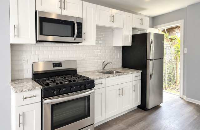 Bright 2-Bedroom Home with a Stylish Kitchen & Central Air Gallery 4
