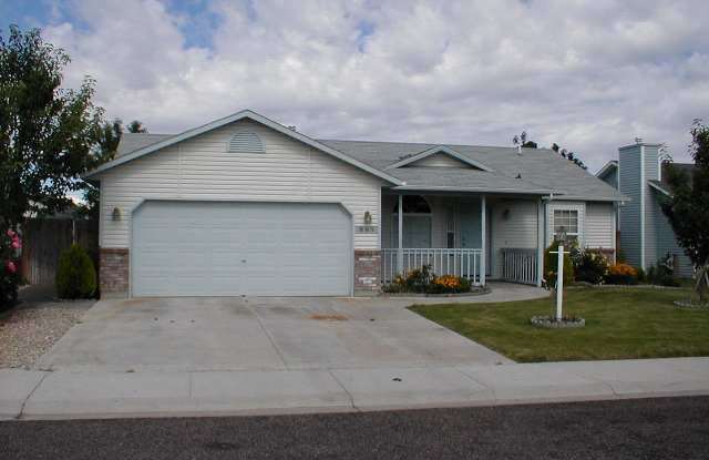 Welcome to this charming 3 bedroom, 2 bathroom home in Boise, ID. photos photos