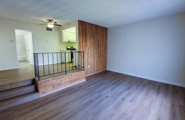 Remodeled Upstairs 2 Bed 2 Bath Condo with 2 Carports, Community Pool and Laundry Available Now! - 991 South Idaho Street, La Habra, CA 90631