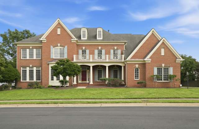 This impressive home combines elegance, comfort, and everyday convenience. photos photos