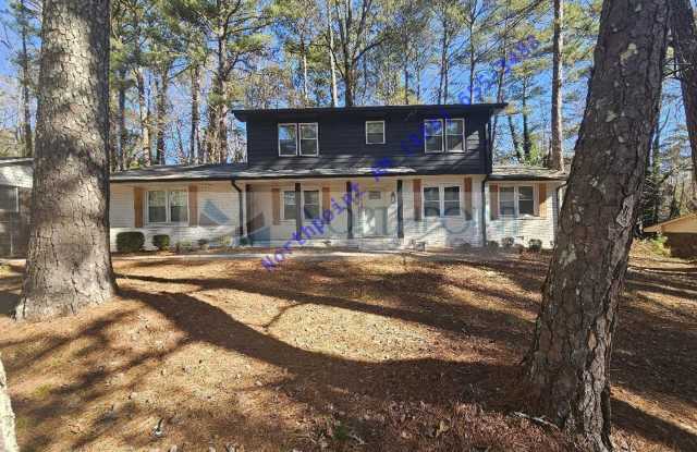 Beautiful 4BR 2BA Home w/ Quartz + SS Kitchen • Fenced Yard • Deck  Porch in SW Atlanta photos photos