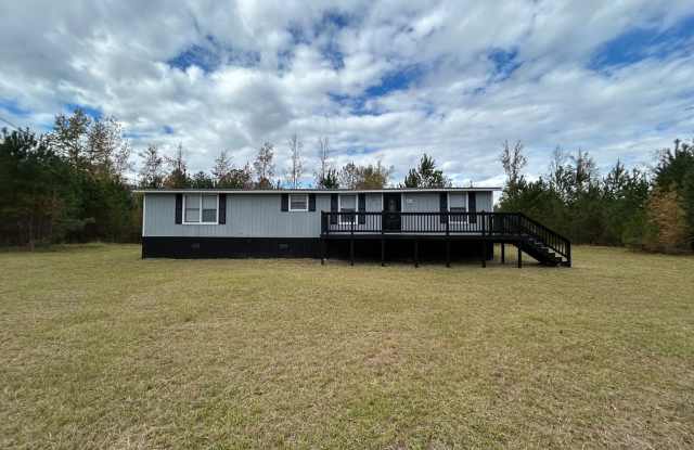 Spacious 3-Bedroom, 2-Bath Mobile Home on 1 Acre – Pet-Friendly and Perfect for Outdoor Living! photos photos