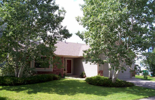 Spacious 3 Bed 2 Bath Fort Collins Home with Sunroom and Fenced Yard photos photos
