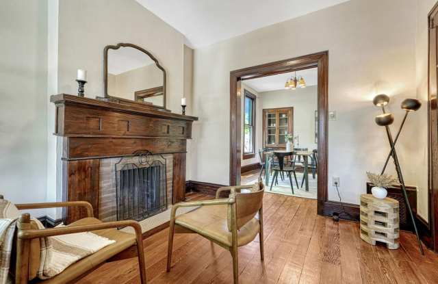 Charming 3-Bedroom Home with Heated Backyard Studio in Aurora Gallery 1