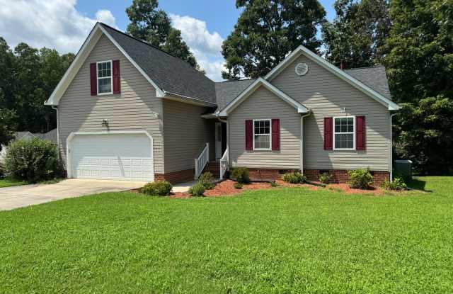Location! 4 bedroom with garage conveniently located behind Hancock Village photos photos