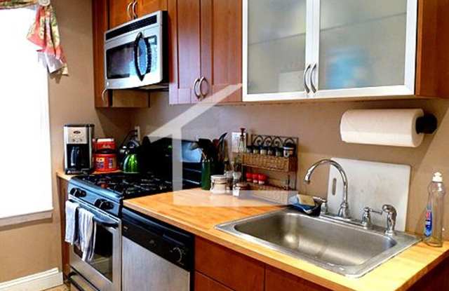 Nicely renovated 3 bed 1 bath unit on the Green Line in Allston! photos photos