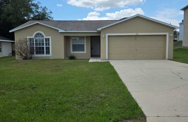 Charming 3-Bedroom Home with New Roof in Quiet Poinciana Location! photos photos