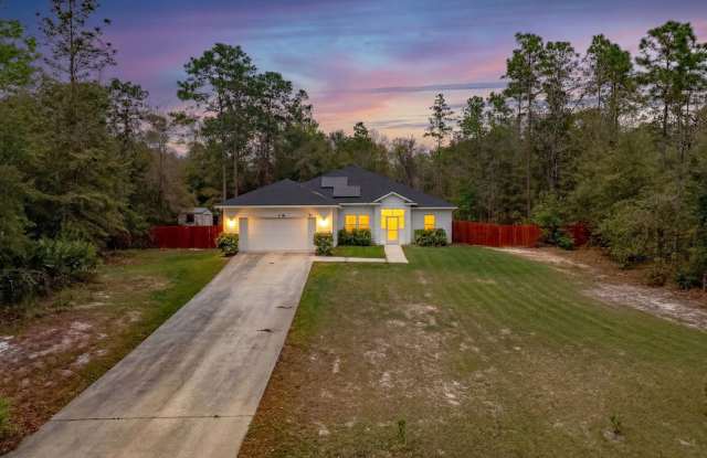 Beautiful 4-bedroom, 2-bathroom home featuring an open-concept layout, perfectly situated on over 1 acre of land photos photos