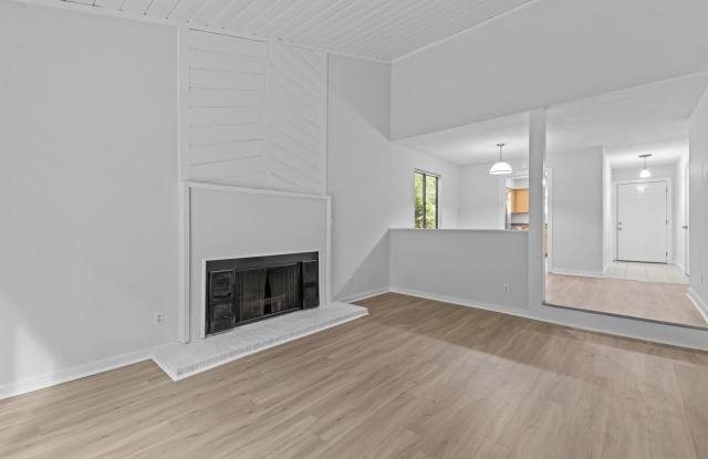 AVAILABLE NOW - Updated 2 Bedroom Duplex w/ Fenced-in Backyard, Large Deck, LVP Floors, Pet Friendly! photos photos