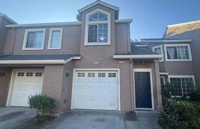 Charming top-level 2-bedroom, 1-bath condo in a highly desirable gated community. photos photos