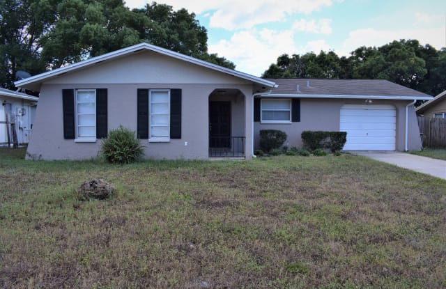 8214 Fox Hollow Dr - 8214 Fox Hollow Drive, Jasmine Estates, FL 34668