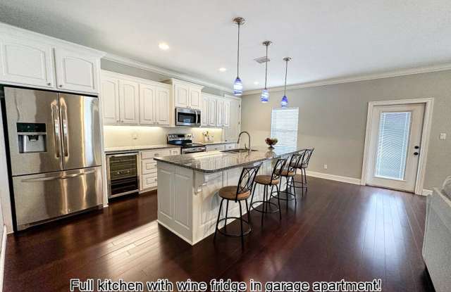 Furnished and utilities included! 1 bedroom garage apartment in *Stonewall* gated neighborhood! photos photos