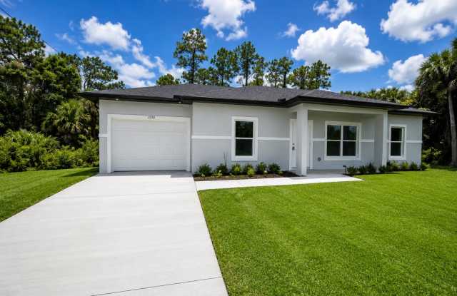 NEW CONSTRUCTION- Modern 3 Bed / 2 Bath Home in E Lehigh Acres Gallery 1