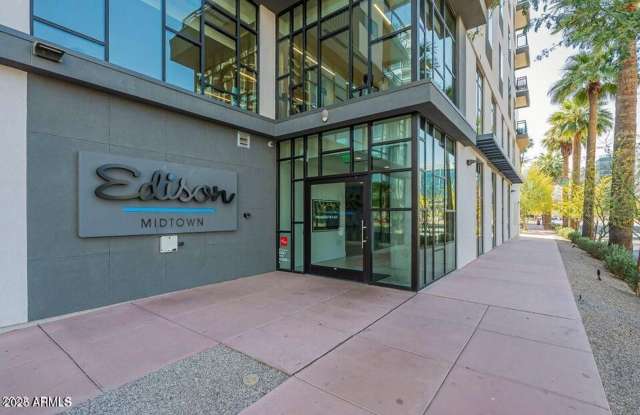 Resort Living in Midtown!! Pool, Dog walk and wash, Light rail downstairs!!! 2k square foot fitness center, Secured Parking!!! Fully remodeled unit!!! End unit with the only wrap around patio!!! - 3131 North Central Avenue, Phoenix, AZ 85012