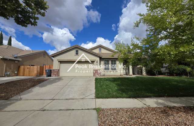 Spacious 4bd/2ba Plumas Lake Home with 2 Car Garage! photos photos