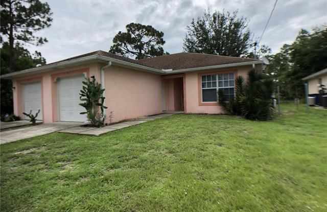 609 Hawthorne AVE S - 609 609/611 Hawthorne Ave S, Lehigh Acres, FL 33974