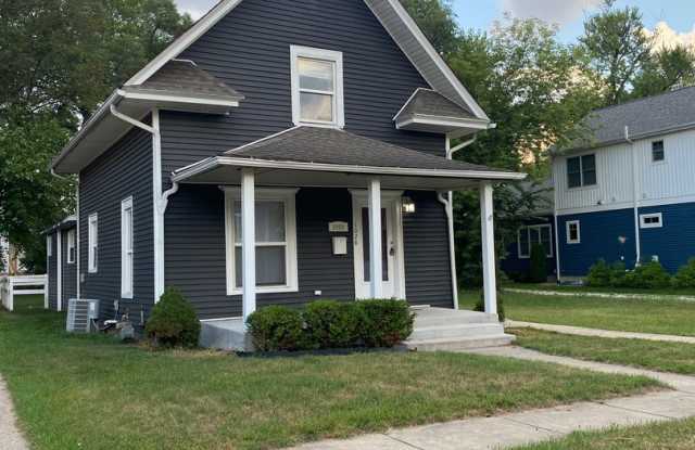 Beautiful new exterior on classic Harters Heights 4 bedroom (3 full baths) blocks from ND. photos photos