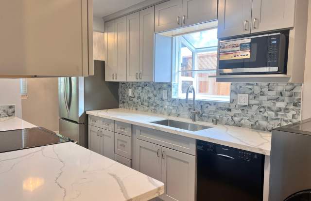 Completely Remodeled 4 Bedroom Home with Central AC and Fans in Every Room! photos photos