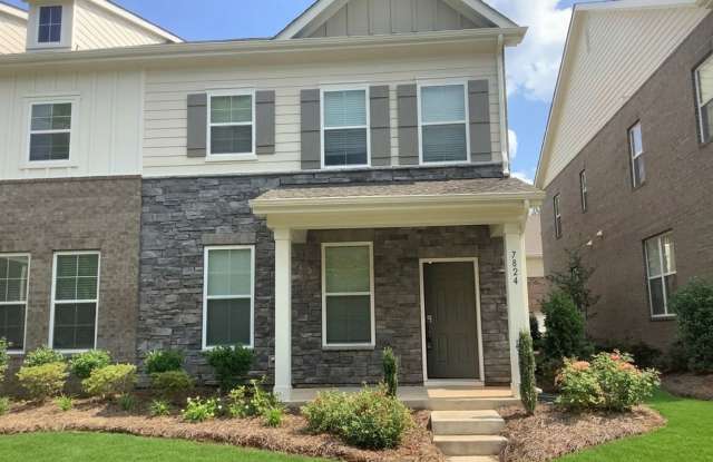 Beautiful Townhouse located in the McEwen Village! photos photos