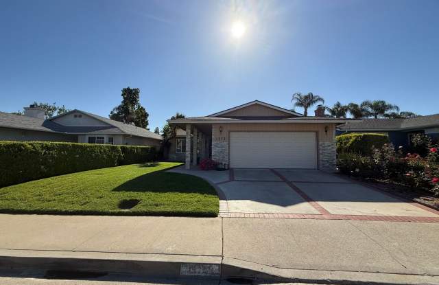 3 bed, 2 bath single story home on a street with a park photos photos