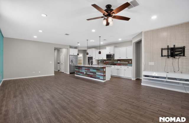 11,000 sq ft lot + wood floor+ huge backyard + gated community + pool + 2-car garage + EV charger + double gate + pet friendly + 1,902 sq ft. Gallery 3