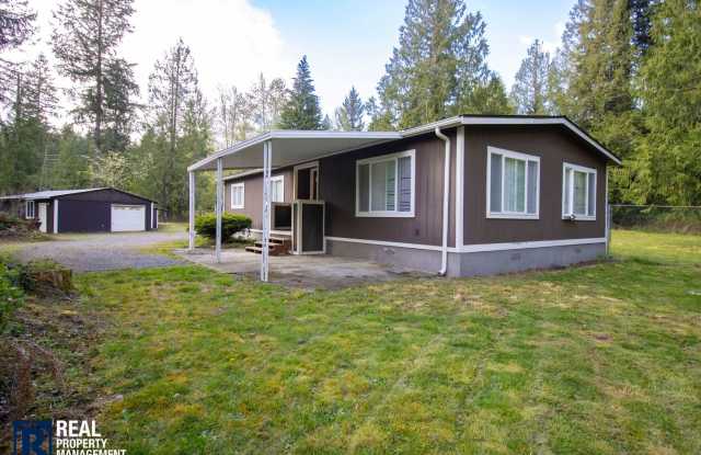 2 Bed / 2 Bath Home with 4-Car Garage, Large Yard & RV Parking in Graham! photos photos