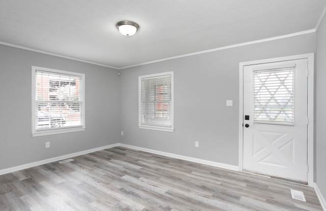 Charming 3 bed/2 bath home with Sunroom and Deck, minutes from Downtown Durham! photos photos