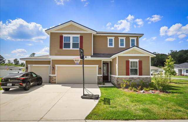 Spacious 4-Bedroom Home with Bonus Room  3-Car Garage in Jacksonville! photos photos