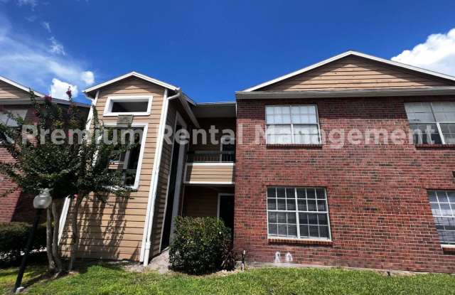 3/2 Regency Gardens 1st Floor Condo with New Plank Fooring, Stainless Appliances, and Fresh Paint! Gallery 1