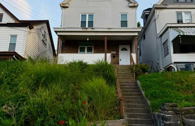 Now showing updated 4BR 1.5 bath house! photos photos