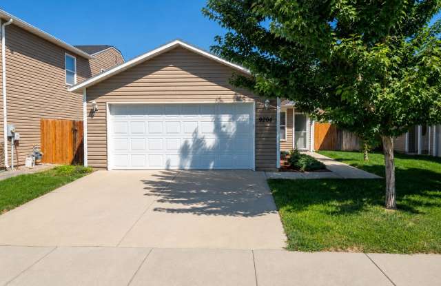 Bright Open-Concept Home with Fenced Yard, Double Garage & Community Amenities photos photos
