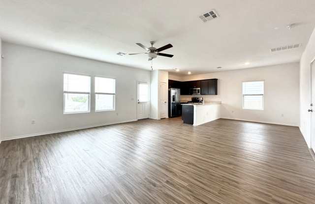 Modern 4/BR 2.5/BA Home with Spacious Living  Large Fenced Backyard photos photos
