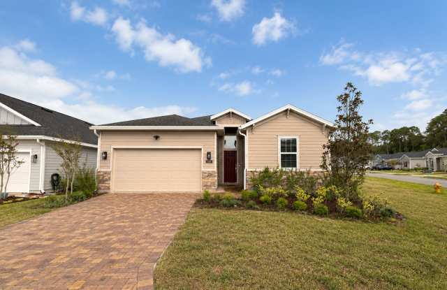 Spacious 4BR/3BA on Large Corner Lot! Water Views, Screened Patio, Double Garage & Outdoor Fireplace! Gallery 1