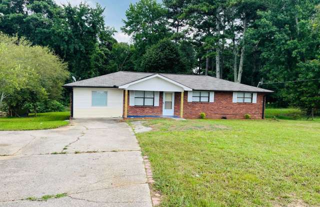 Wow! Check out this charming 4-bedroom, 1-bathroom home located in Douglasville! photos photos