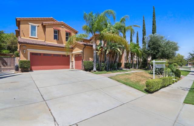 Price Improvement! Stunning 5/4.5 pool home located in the desirable North Fontana Coyote Canyon area. photos photos