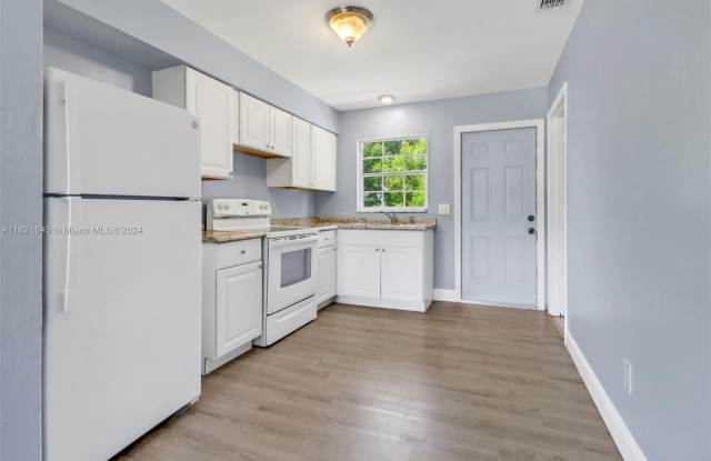 1106 HARRY AVE S - 1106 Harry Avenue South, Lehigh Acres, FL 33973