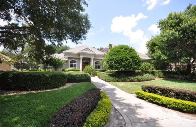 9084 GREAT HERON CIRCLE - 9084 Great Heron Circle, Bay Hill, FL 32836