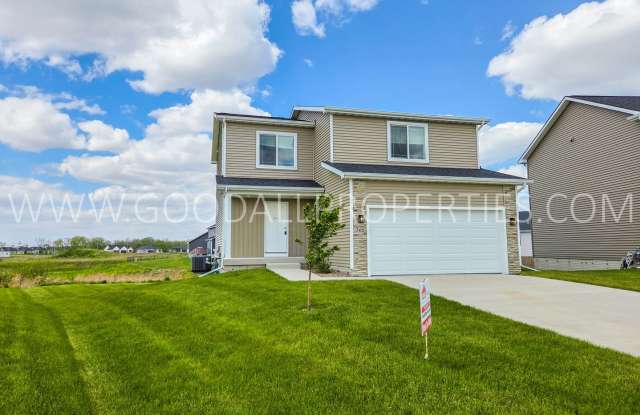 Spring Move-In Special: Spacious 5-Bedroom Home with Finished Basement in the Waukee School District! Gallery 1