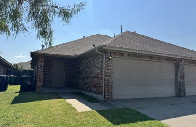 3-bedroom duplex with new carpet in the bedrooms and a 2-car garage ready for move in! photos photos