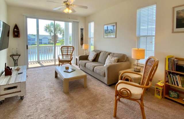 FULLY FURNISHED CONDOMINIUM IS SOUGHT-AFTER SANDPIPER BAY! Gallery 3