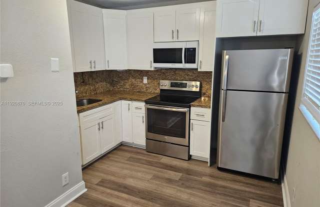 651 NW 42nd Ct photos photos