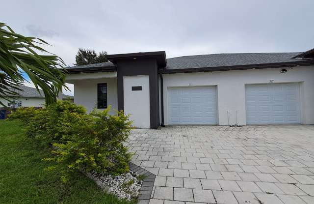 Beautiful 3 Bedroom Duplex in Lehigh/No HOA/RECENTLY REDUCED photos photos