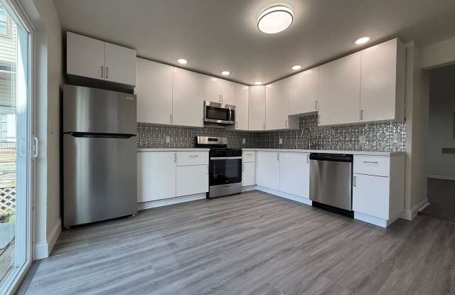 Updated 4BR / 2 Bath Home with off-street parking! photos photos