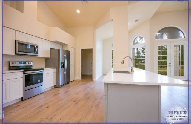 **NO HOA**UNFURNISHED ANNUAL**GOLDEN GATE ESTATES**COMPLETE REMODEL**3 BED 2 BATH HOME**2.9 ACRE LOT** photos photos