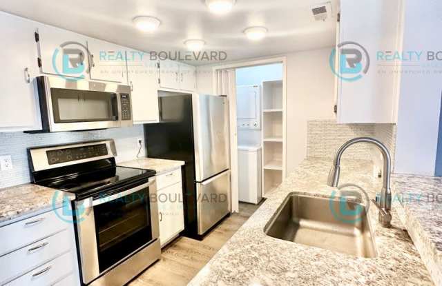 Indulge in comfortable living at Wood Chase Condos! photos photos
