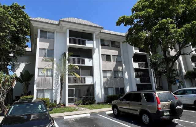 711 N Pine Island Rd photos photos