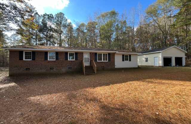 Charming 3BD, 2BA Wake Forest Home on a Large, Private Lot with a Detached 2-Car Garage, Providing Easy Access to Raleigh and Durham photos photos